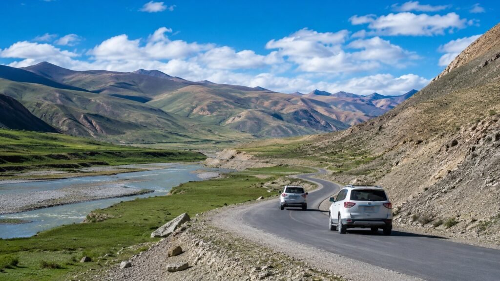 Private tour vehicles crossing the broad Gyirong and Saga plateau sector